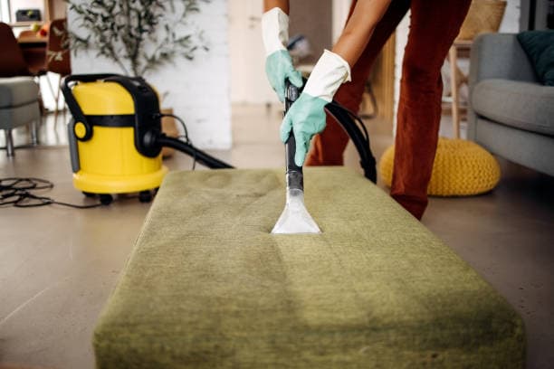 Deep cleaning service scrubbing a bathroom for a move-in ready home